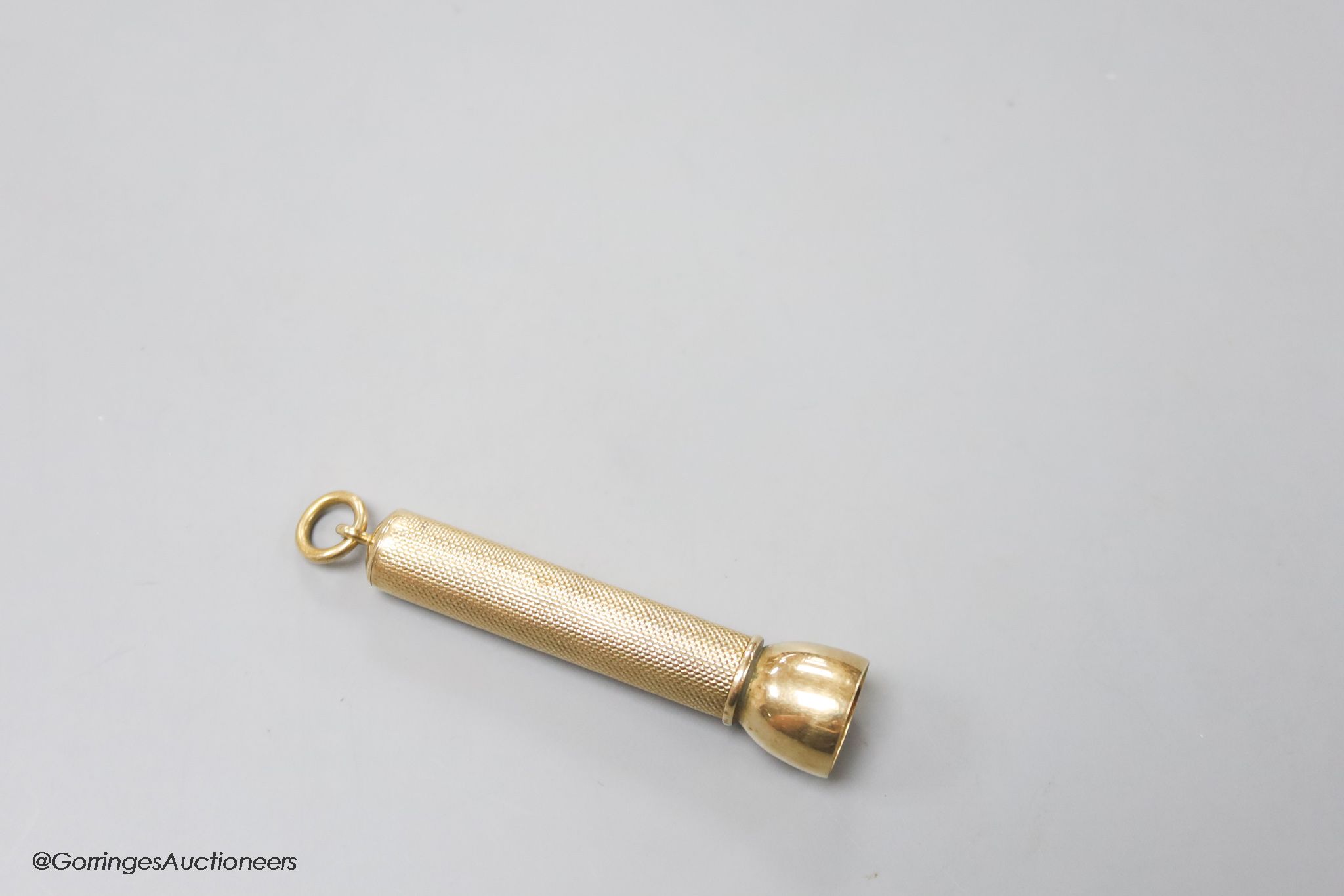 A George V 9ct gold cased cigar piercer by Sampson Mordan & Co, 61mm, gross 14.7 grams.